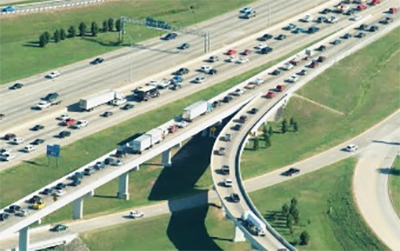 Aerial view of an elevated highway interchange.